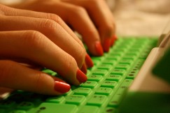 hands typing on keyboard by klepas via Flickr
